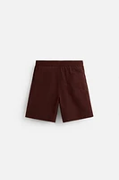DRAWSTRING SWIM TRUNKS