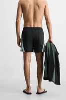 CONTRAST BANDS MID-LENGTH SWIMSUIT