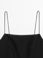 Strappy top with contrast topstitching