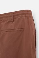 PLEATED POPLIN PANTS