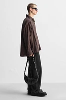 OVAL CROSSBODY BAG