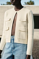 GILET EN MAILLE AVEC POCHES