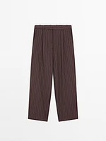 Pantalon à pinces et rayures tennis