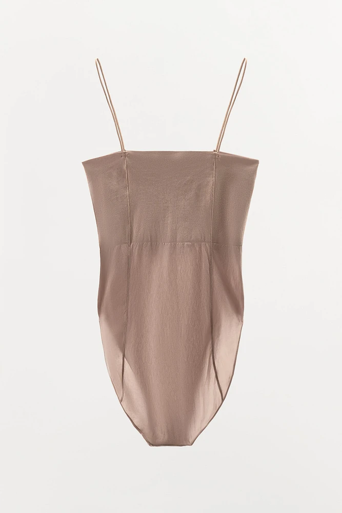FITTED STRAPPY BODYSUIT WITH SEAMS