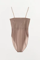 FITTED STRAPPY BODYSUIT WITH SEAMS