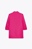 VESTE À MANCHES RETROUSSÉES