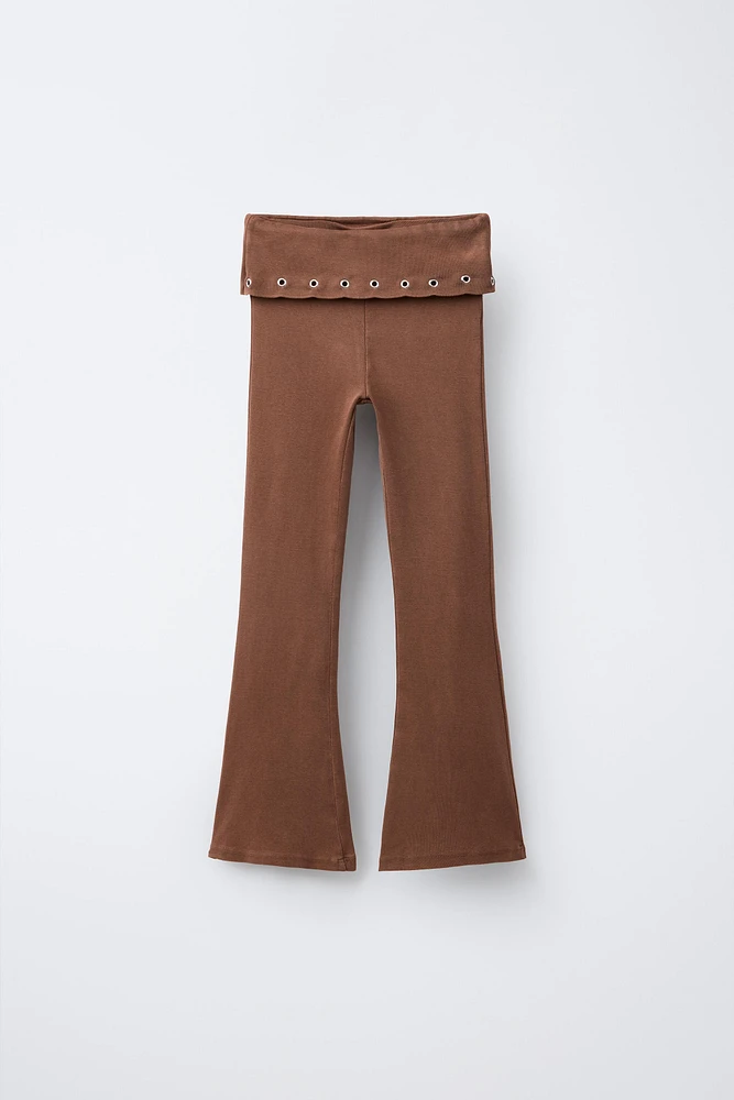 FOLD-OVER WAISTBAND FLARE LEGGINGS WITH EYELETS