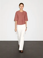 Top en cuir finition daim avec liens