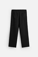 FLOWY PLEATED PANTS