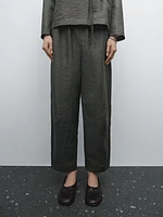Suit trousers with elasticated waistband