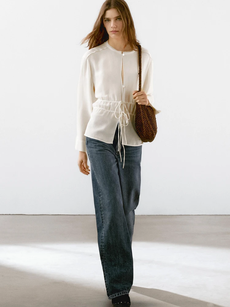 Flowing semi-sheer blouse with ties
