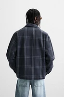 VESTE À CARREAUX ZIPPÉE