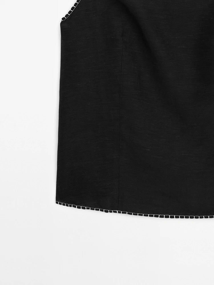 Strappy top with contrast topstitching