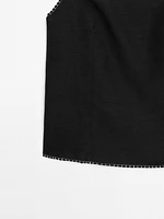 Strappy top with contrast topstitching