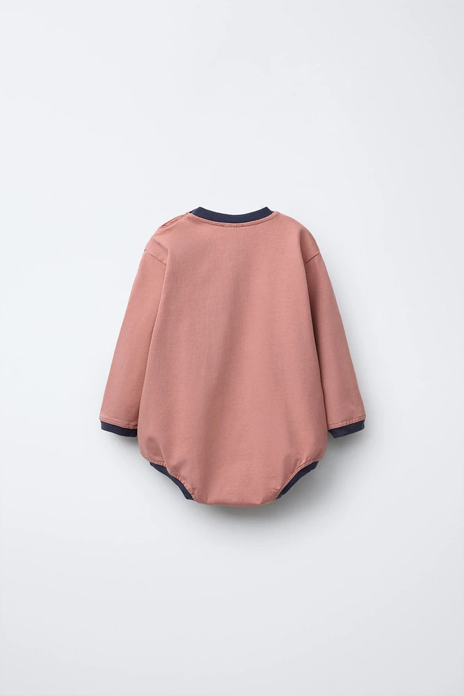 CONTRAST PLUSH BODYSUIT