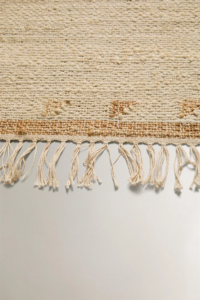 JUTE AND COTTON AREA RUG WITH FRINGING