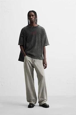 T-SHIRT DÉLAVÉ EN MAILLE IMPRIMÉE
