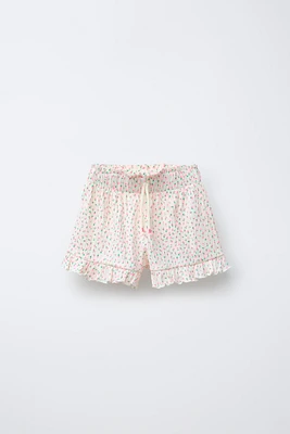 PRINTED RUFFLE SHORTS