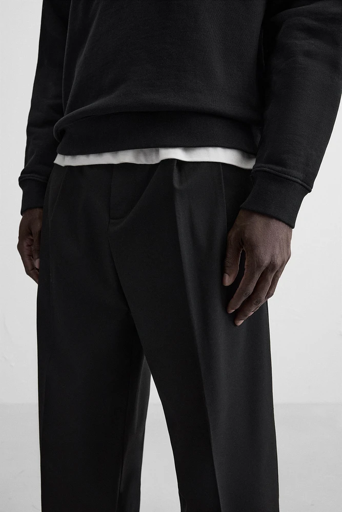 PLEATED WIDE FIT PANTS