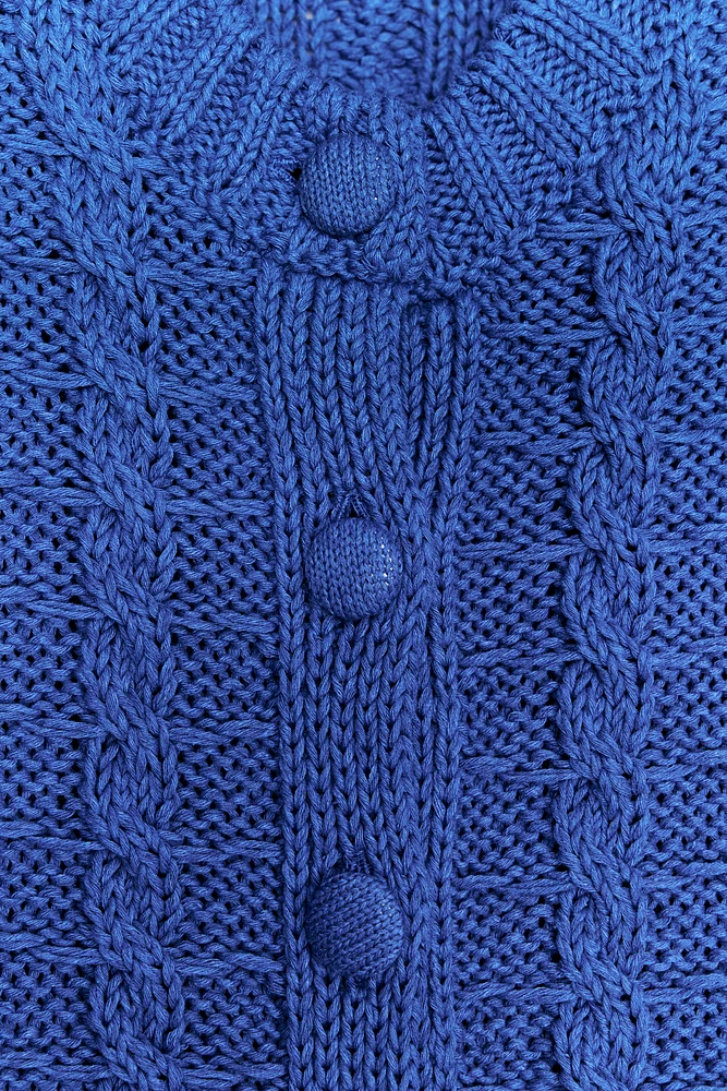 GILET EN MAILLE À MANCHES COURTES