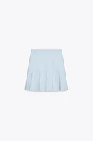BOX PLEAT KNIT MINI SKIRT