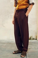 LIMITED EDITION PLEATED WOOL PANTS