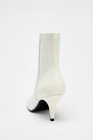 LEATHER TOPSTITCHED ANKLE BOOTS