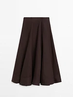 Flared linen skirt with hem detail