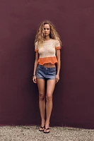 TOP EN MAILLE MANCHES COURTES