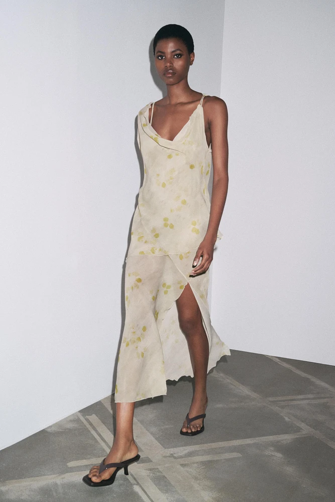 FLORAL PRINT CAPE DRESS