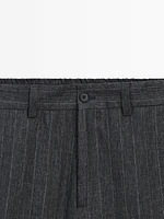 Faded 100% linen striped trousers