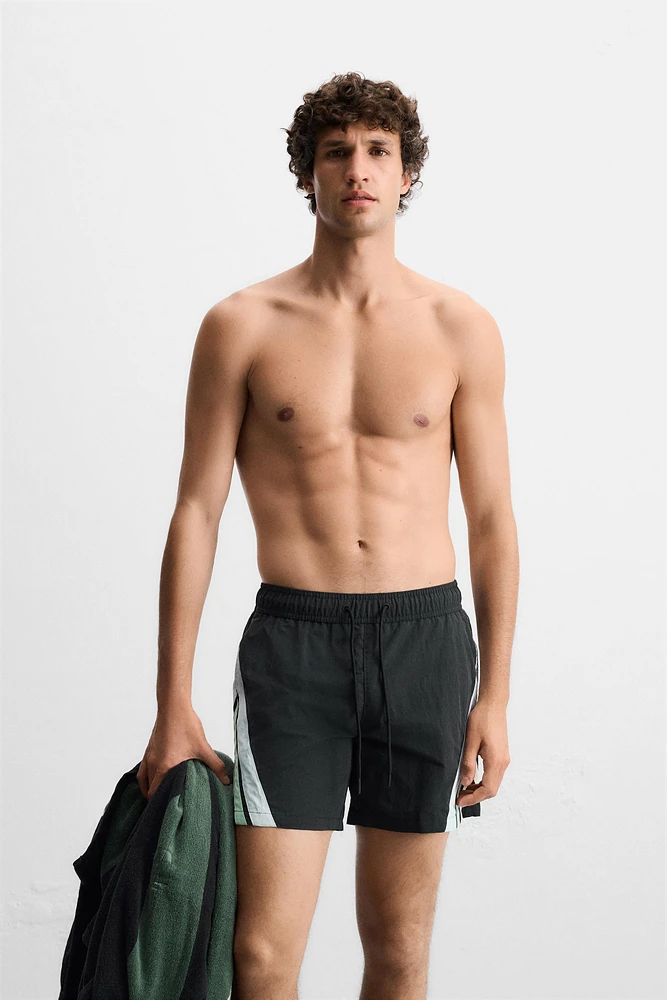 CONTRAST BANDS MID-LENGTH SWIMSUIT
