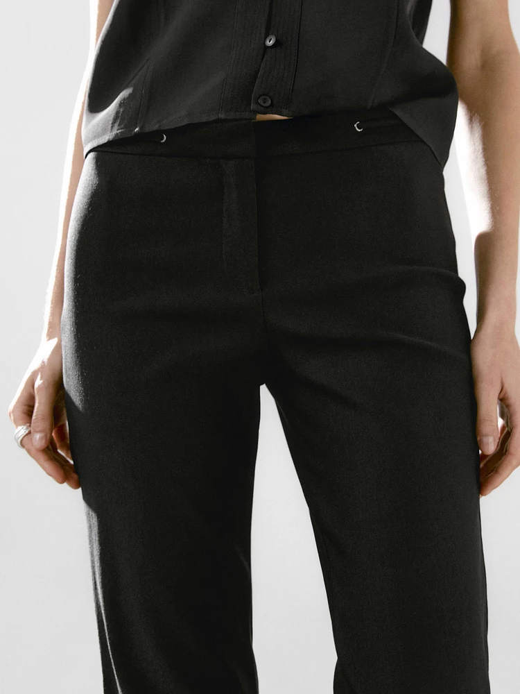 Flared trousers with waist detail