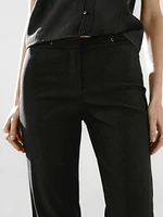 Flared trousers with waist detail