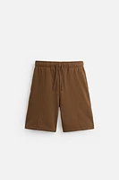 BERMUDA DE JOGGING COUTURES