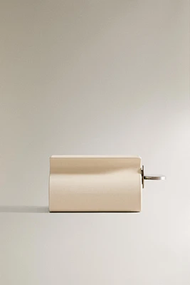 TOOTHPASTE DISPENSER