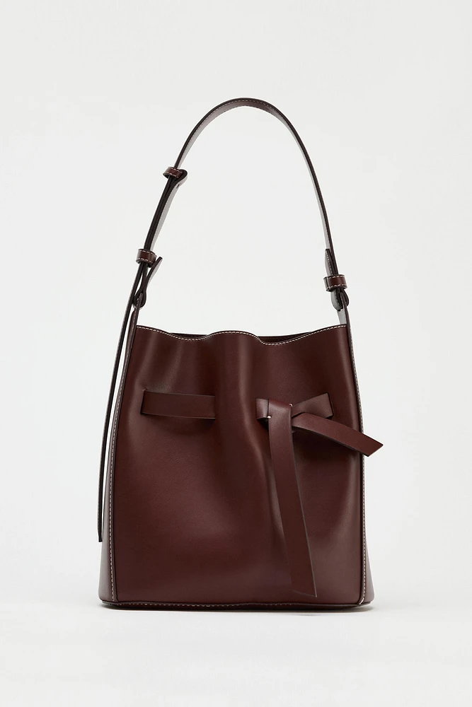 KNOTTED TOPSTITCHED BUCKET BAG