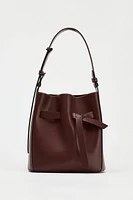 KNOTTED TOPSTITCHED BUCKET BAG