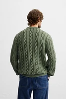 WASHED CABLE-KNIT SWEATER