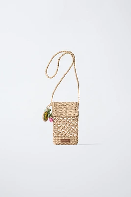 RAFFIA EFFECT PHONE CASE WITH CHARM