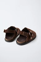 SABOTS EN CUIR