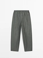 Suit trousers with elasticated waistband