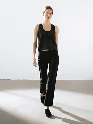 Flared trousers with waist detail