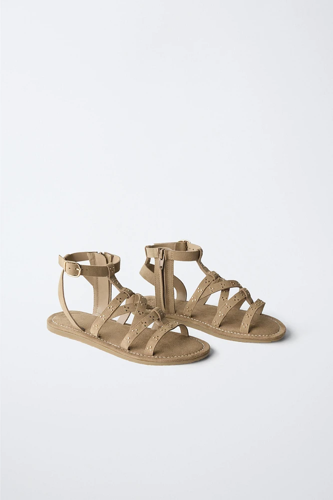 SANDALES À CLOUS EN DAIM