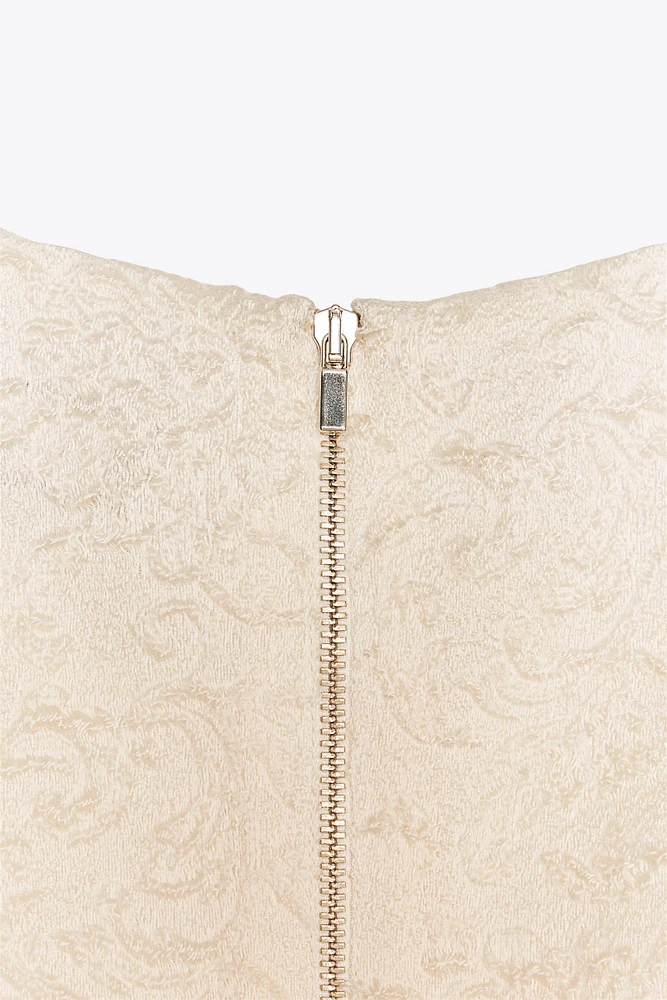 TEXTURED PEPLUM TOP