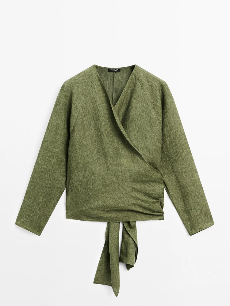Flowing linen blouse with tie detail at the waist