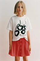 BUTTON SKORT