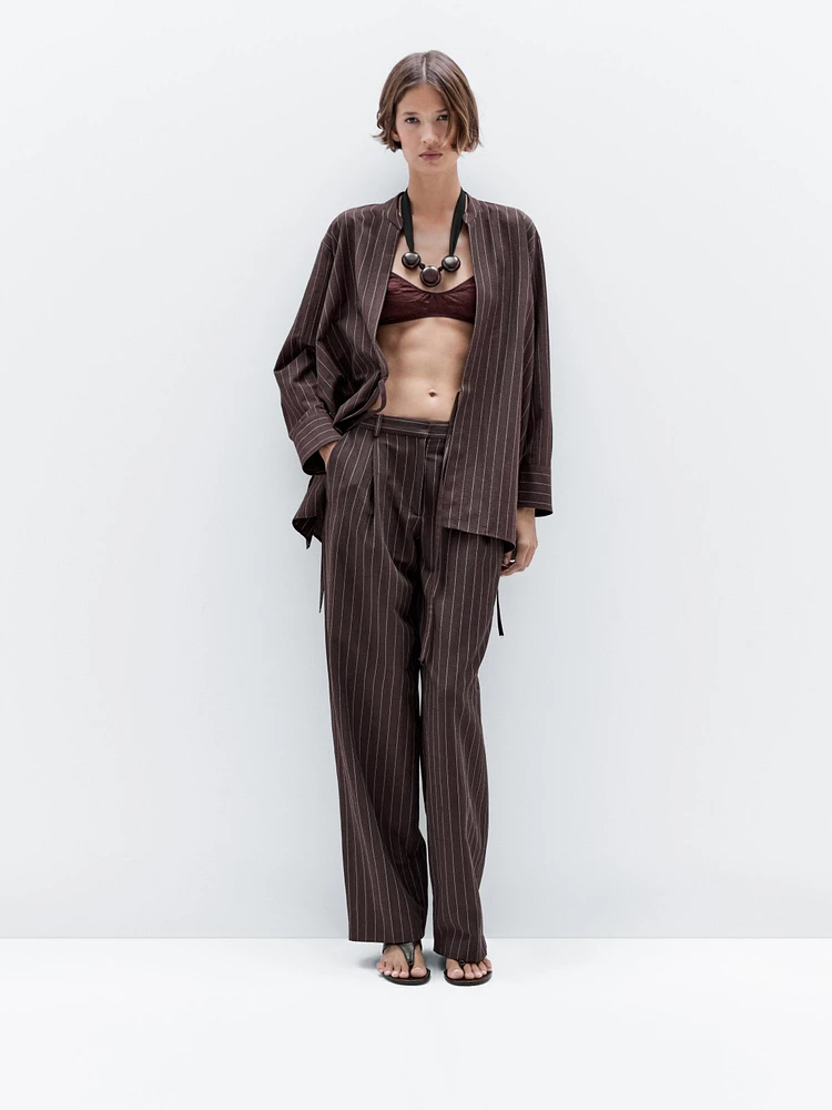 Pantalon à pinces et rayures tennis