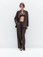 Pantalon à pinces et rayures tennis