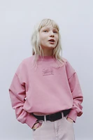 LABEL DETAIL BALLOON-HEM CROPPED SWEATSHIRT